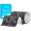 Rolls of black and white OKTAPE kinesiology tape next to its packaging box.