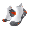 A pair of white performance sports ankle socks with gray and orange accents.