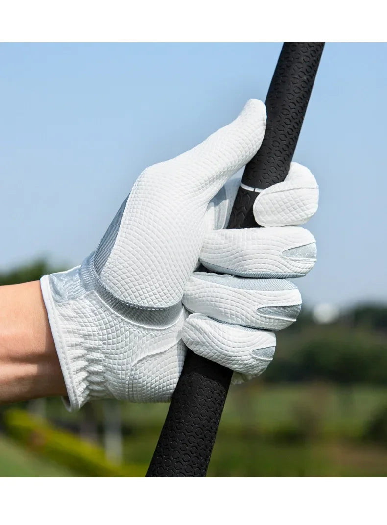 A hand wearing a white golf glove grips a black golf club shaft outdoors.