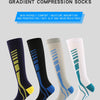 Five pairs of gradient compression socks in various colors including navy, black, beige, and white are displayed.