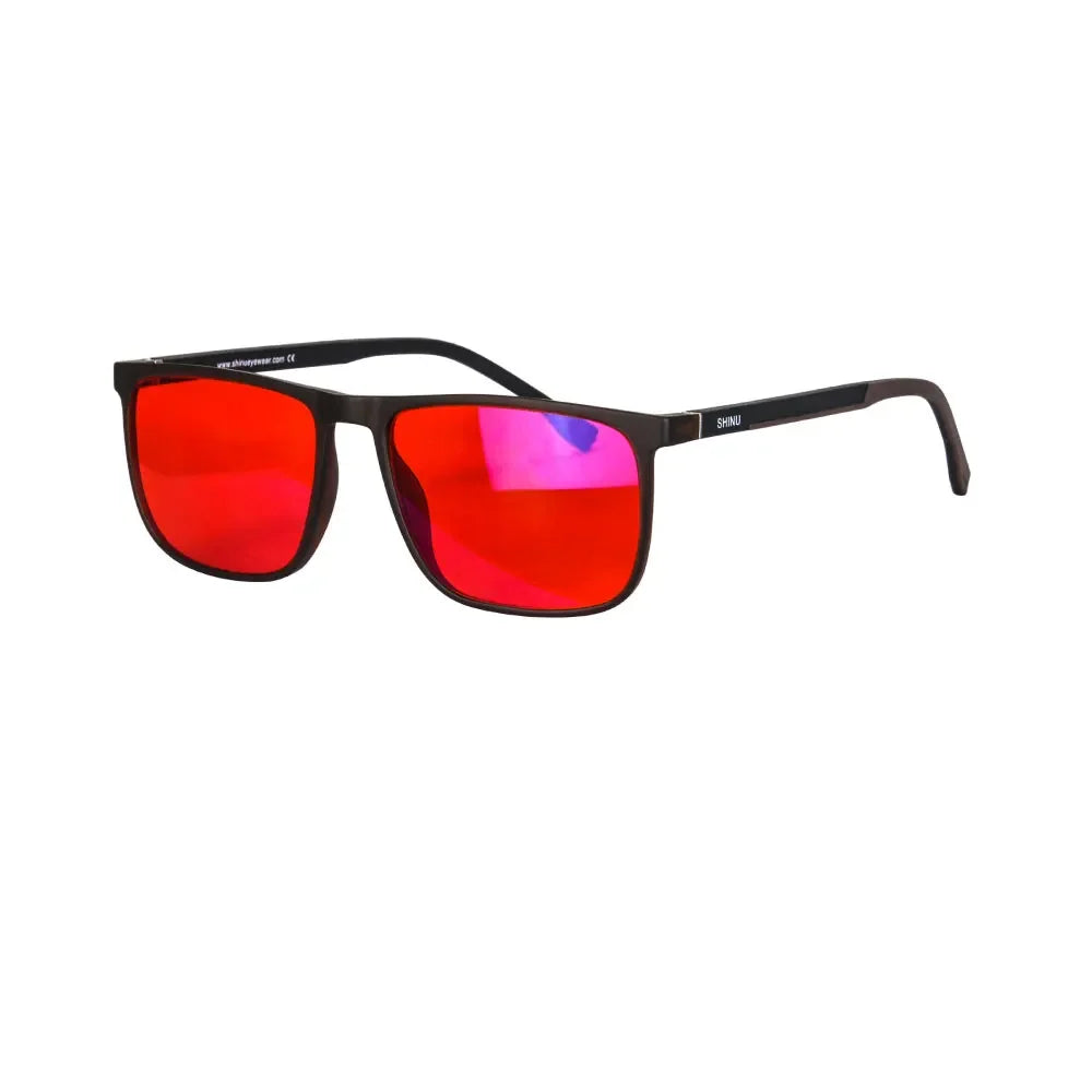 A pair of blue light blocking glasses with vibrant red lenses and black frames.