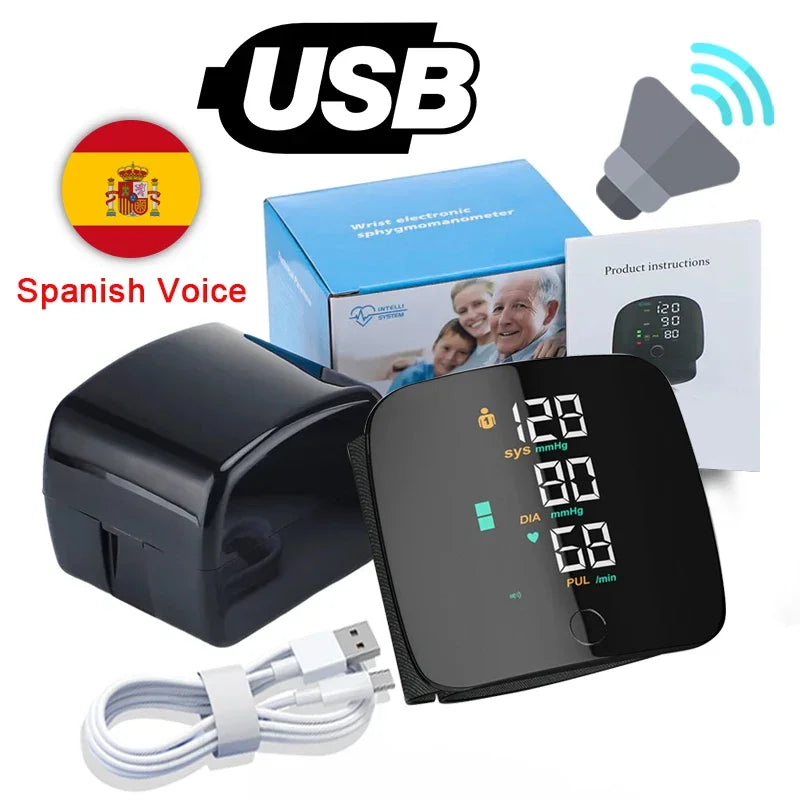 A black digital wrist blood pressure monitor with a screen displaying 128/80 mmHg, along with its USB cable and instructions.