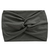 A dark gray women's elastic sports headband tied in a knot.