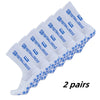 Two pairs of white non-slip grip football socks stacked diagonally.