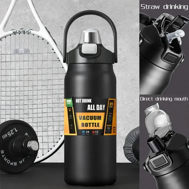 Black insulated stainless steel water bottle with a metal straw drinking mechanism