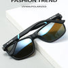 Black KAROE polarized sunglasses resting on a white surface.