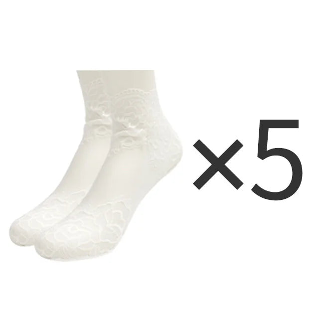 Five pairs of white lace mesh ankle socks displayed on a white background.