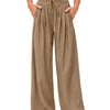 A model is wearing flowy high waist drawstring wide leg pants in a khaki green color.