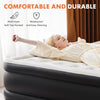 A person is lying on a gray air mattress with a beige cover, demonstrating its comfortable and durable features.