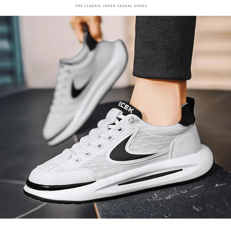 A close-up of a white Nike Joker casual shoe being worn on a foot.