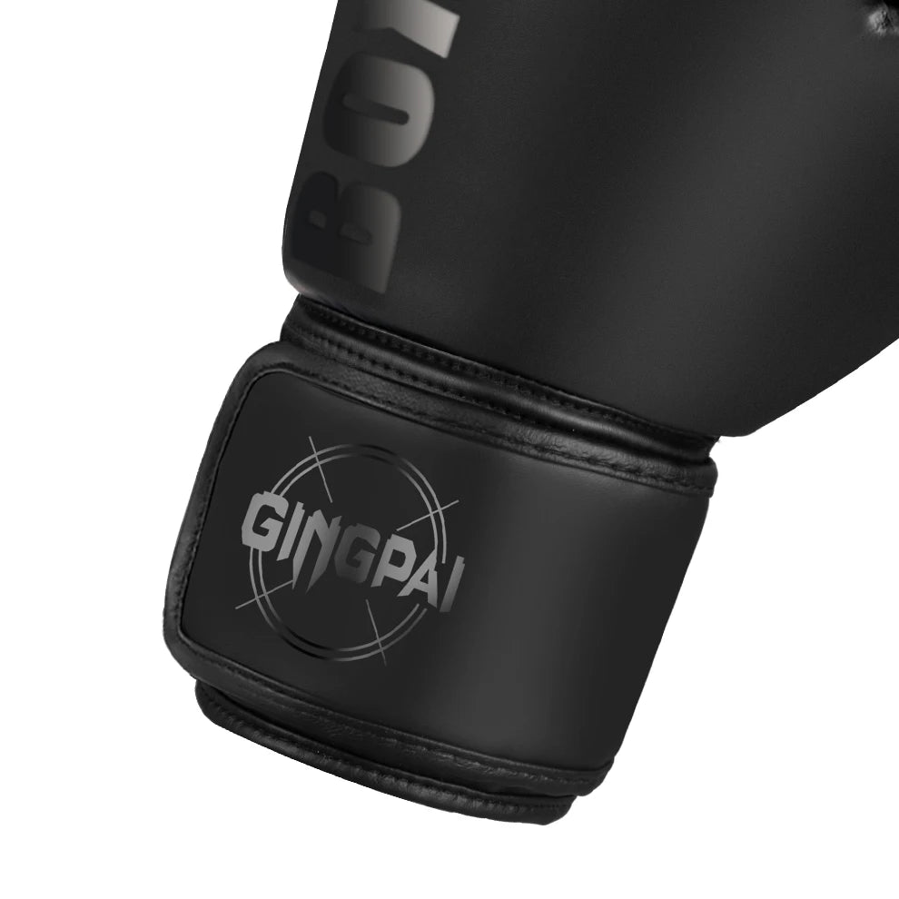 Black boxing gloves with the GINGPAI logo visible on the wrist strap.