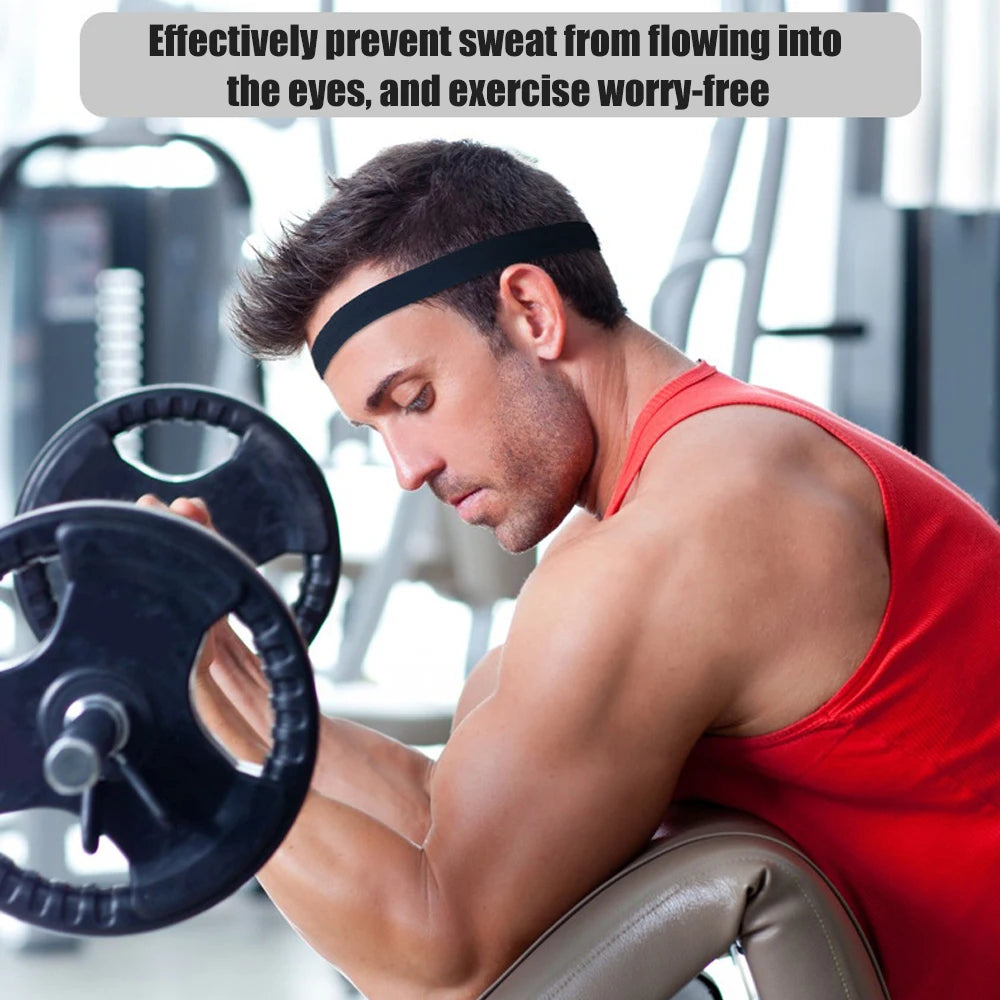A man exercising with a red tank top and black headband, preventing sweat from flowing into his eyes.