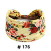 Tire-lotte de tête en coton stretch floral boho jaune avec un détail de nœud