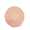 A round, light beige adhesive patch used for sensor fixing.