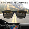 Pair of sunglasses featuring sunscreen polarization safety protection viewed through a car windshield.