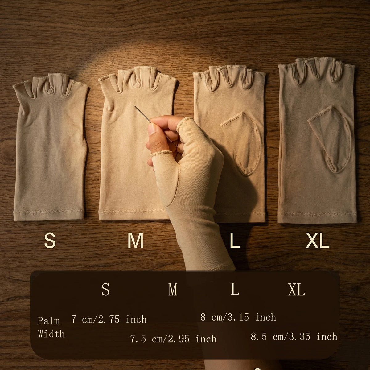 A set of beige fingerless compression gloves displayed with size labels S through XL.