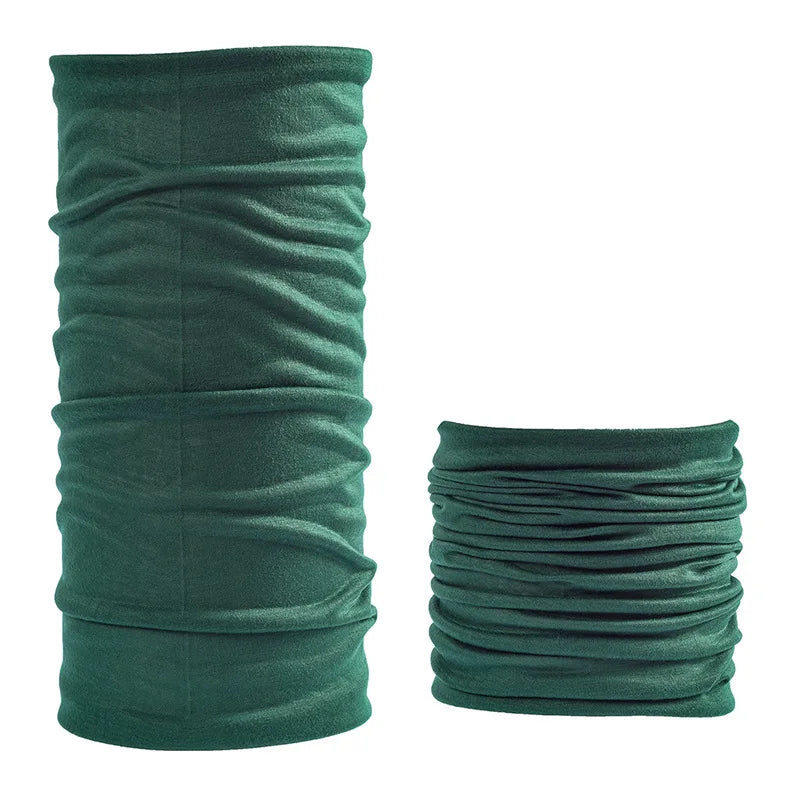 A roll of dark teal seamless fabric headbands and balaclavas.