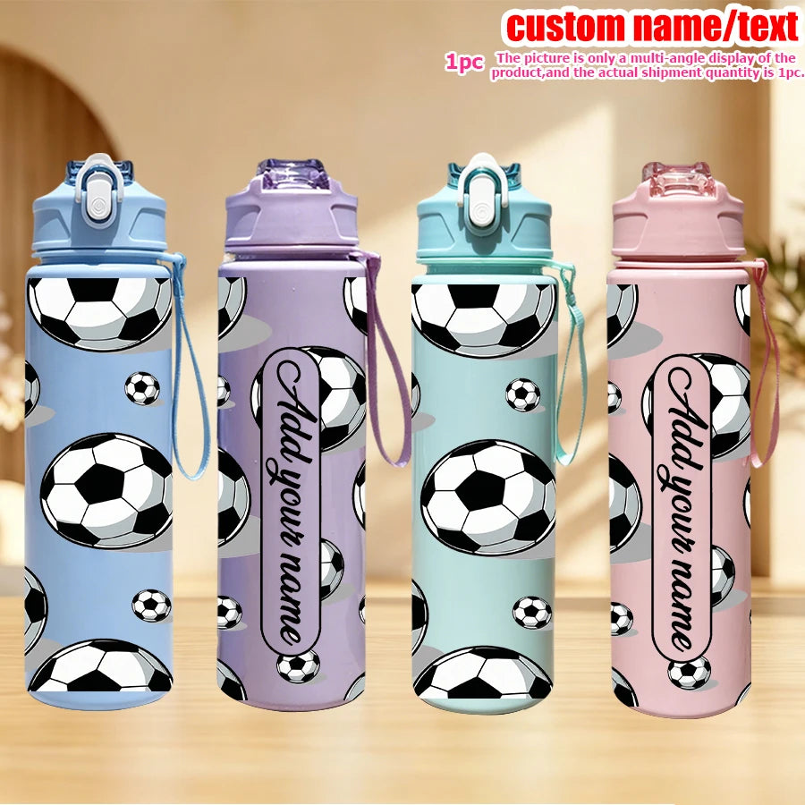 Four colorful football water bottles in various shades and designs displayed on a wooden surface.