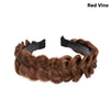A brown hair accessory featuring a bohemian style braid made from synthetic hair.