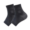 A pair of black ergonomic plantar fasciitis relief socks shown from the side.