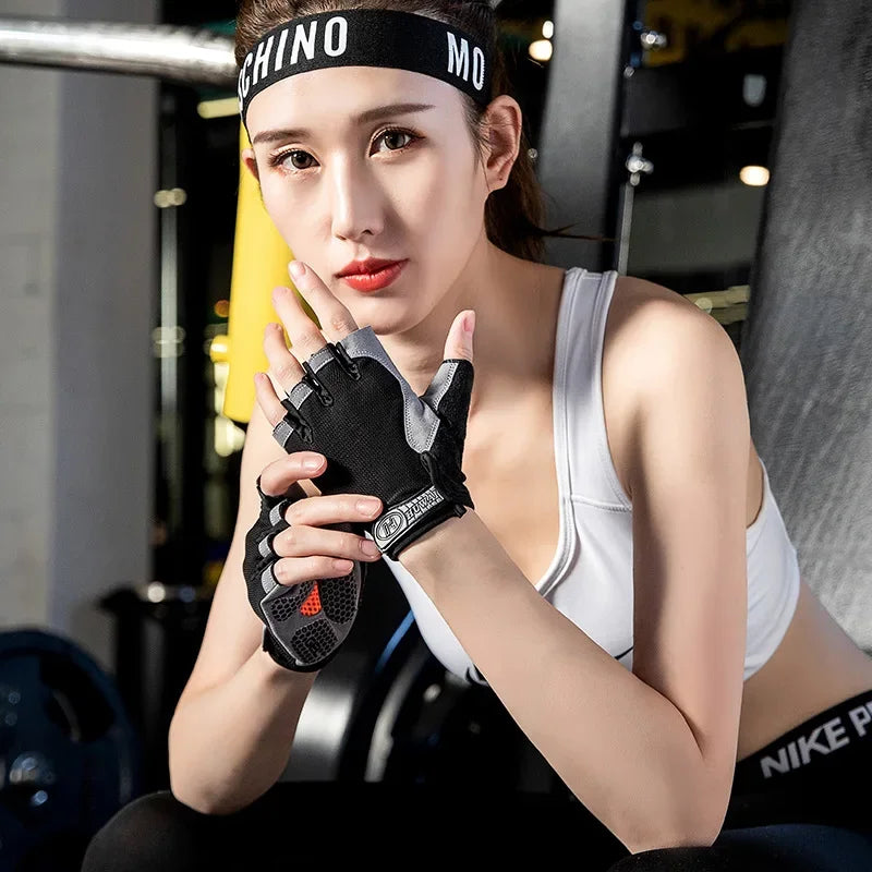 A woman wearing black breathable half-finger sport gloves while exercising or cycling.
