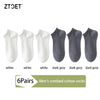 A set of six pairs of men's combed cotton socks in white and dark grey colors.