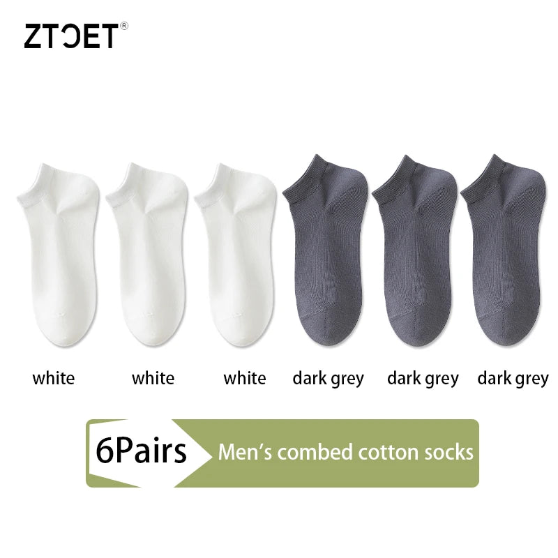 A set of six pairs of men's combed cotton socks in white and dark grey colors.