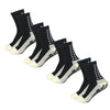 A set of black and white multi-sport silicone grip socks for men displayed on a white background.