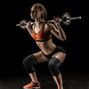 A female athlete lifts a barbell during a weightlifting exercise while wearing black knee sleeves.