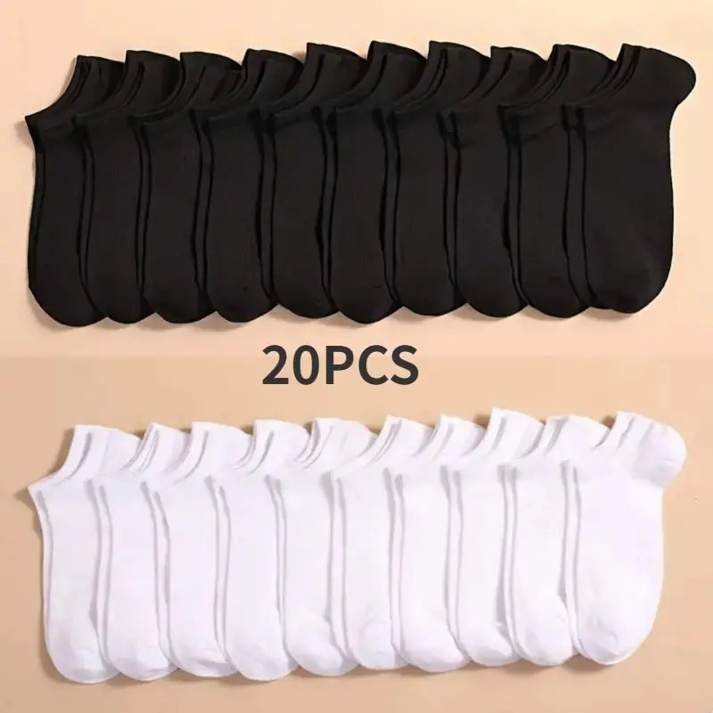 A set of 20 pairs of black and white breathable unisex boat socks laid out for display.