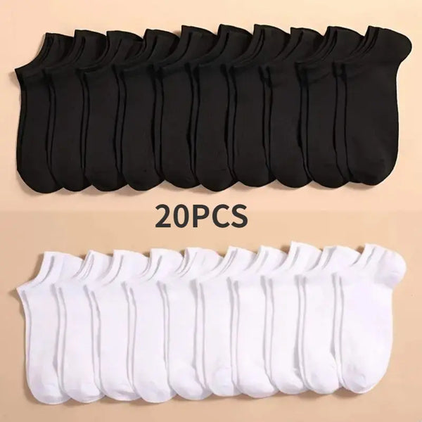 A set of 20 pairs of black and white breathable unisex boat socks laid out for display.