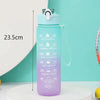A purple sports water bottle with a straw and motivational time markers is shown against a teal background.