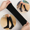 A black thigh high elastic sock is shown being pulled onto a foot, with close-ups of the sock and a pair worn on a foot.