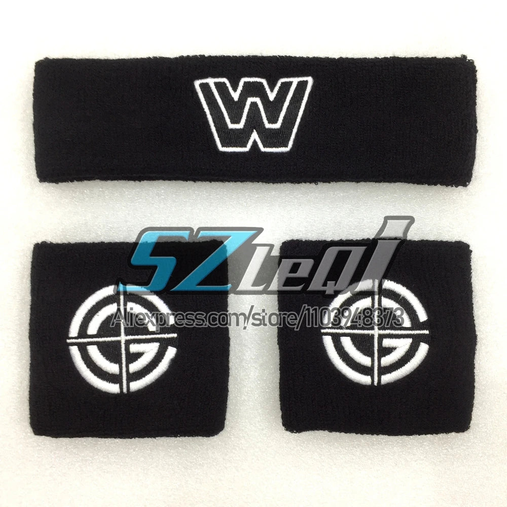 Two black embroidered cotton sports wristbands featuring a white letter W and a white geometric design.
