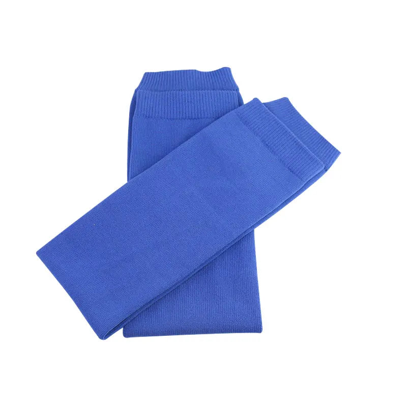 A pair of royal blue performance rugby leg covers for football training.