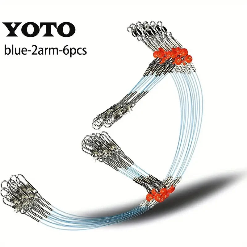 A set of six blue two-arm fishing hooks with red beads, used for saltwater tackle rigging.