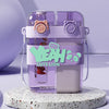 A purple double-walled drinking cup with a straw and lid featuring a cute lion design.