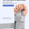 A hand is adjusting a gray elastic strap design wrist support brace for joint pain relief.