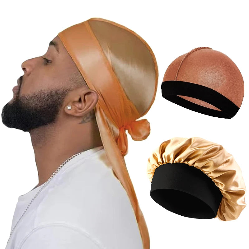 A man wearing a silky orange durag pirate headband with a gold-colored fabric and black trim.
