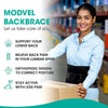 A smiling woman wearing a blue shirt and black backbrace, demonstrating the orthopedic lumbar support belt.