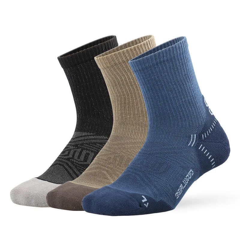A stack of four breathable performance running socks in shades of black, olive green, tan, and navy blue.