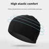 Bonnet de bain élastique noir vu de dessus, mettant en évidence sa structure tridimensionnelle.