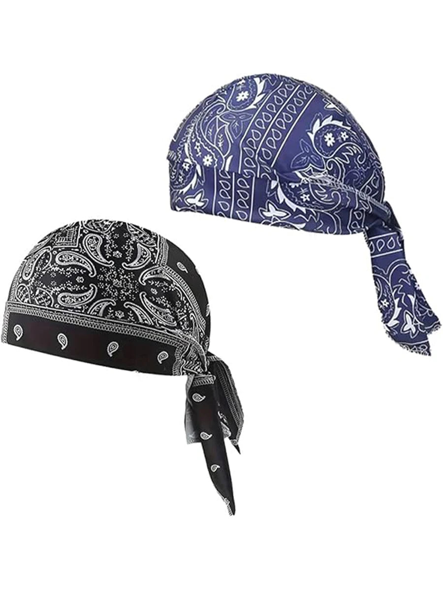 A set of two paisley cooling headscarf caps, one blue and white patterned, and one black and white patterned.