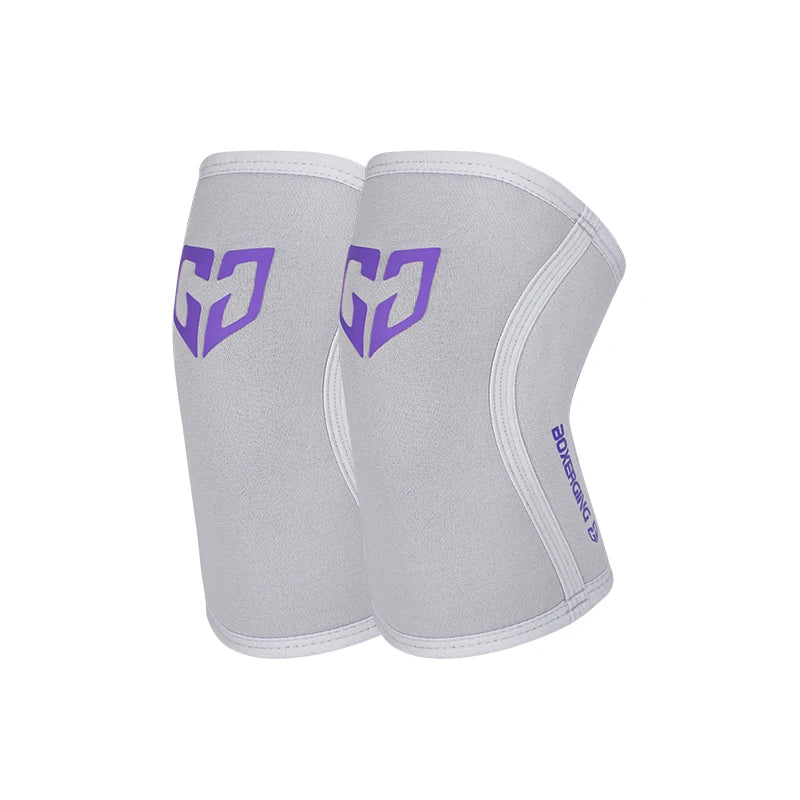 Pair of light gray compression knee sleeves with purple geometric designs