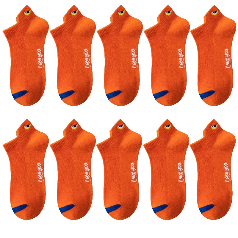 A set of eight orange ankle boat socks for men, displayed in a grid.