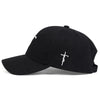 Black unisex embroidered snapback baseball cap with a white cross design