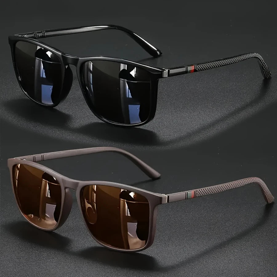 A pair of vintage square sunglasses with dark lenses and brown frames are displayed on a dark surface.