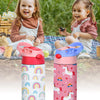 Two young girls smiling while holding colorful cartoon pattern insulated stainless steel thermos cups.