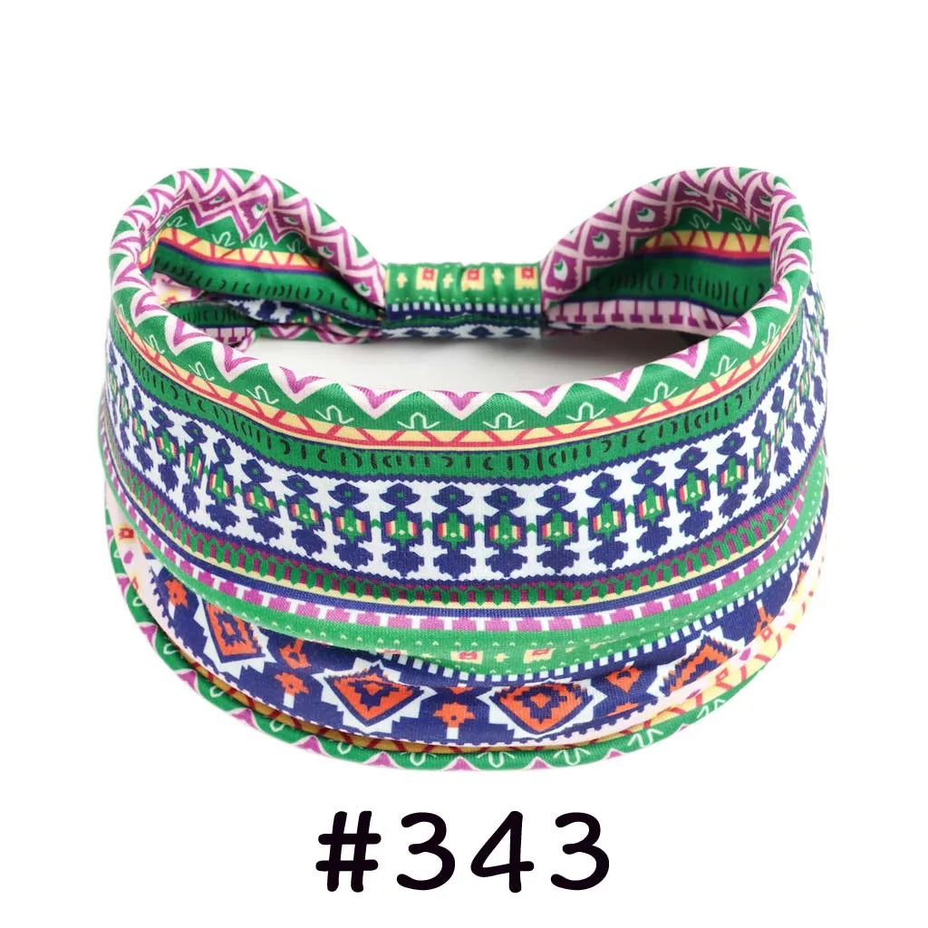 Boho knotted cotton headband featuring colorful geometric patterns in green, purple, and white.