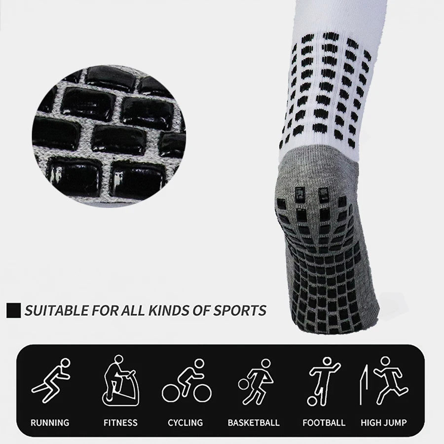 A close-up view of black and white professional training football socks with a patterned design.